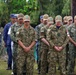 Multinational service members participate in a commemoration ceremony of the Battle of Peleliu.