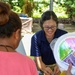 Lt. Cmdr. Mari Moffitt, educates locals about the importance of proper nutrition during Pacific Partnership 2025.
