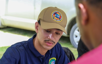 Hospitalman Rajvir Bassi, educates locals about the importance of personal health during Pacific Partnership 2025.