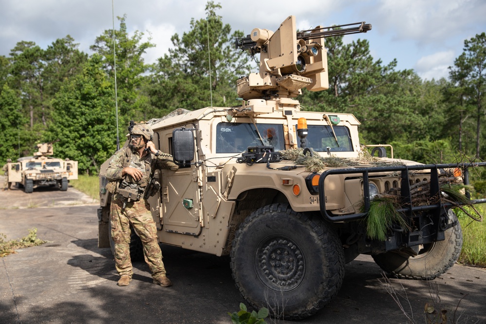 Iowa National Guard Soldier maintains radio communications at JRTC