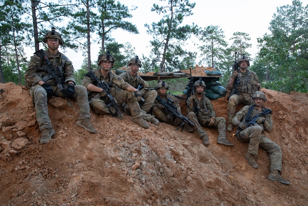 Iowa National Guard Soldiers pause during JRTC rotation