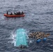 U.S. Coast Guard Cutter Seneca recovers bales of cocaine after drug smuggling interdiction