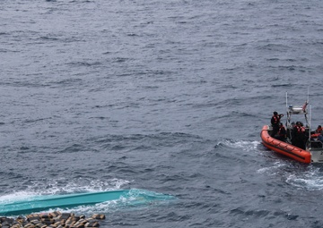 U.S. Coast Guard Cutter Seneca recovers bales of cocaine after drug smuggling interdiction
