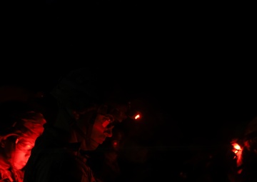 A U.S. Army Soldier Plots Points in Pursuit of Army Expert Badge