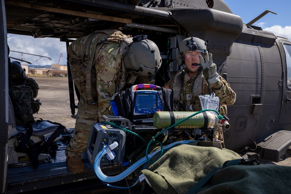 25th CAB Critical Care Flight Paramedic Conducts Medical Evaluation