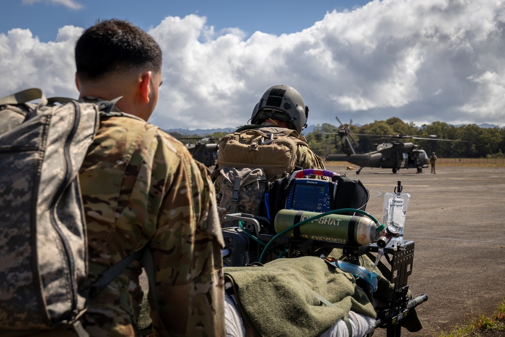 25th CAB Critical Care Flight Paramedic Conducts Medical Evaluation