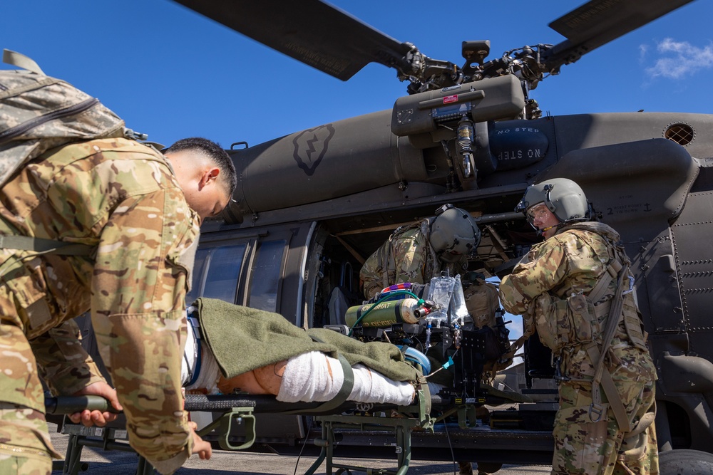 25th CAB Critical Care Flight Paramedic Conducts Medical Evaluation