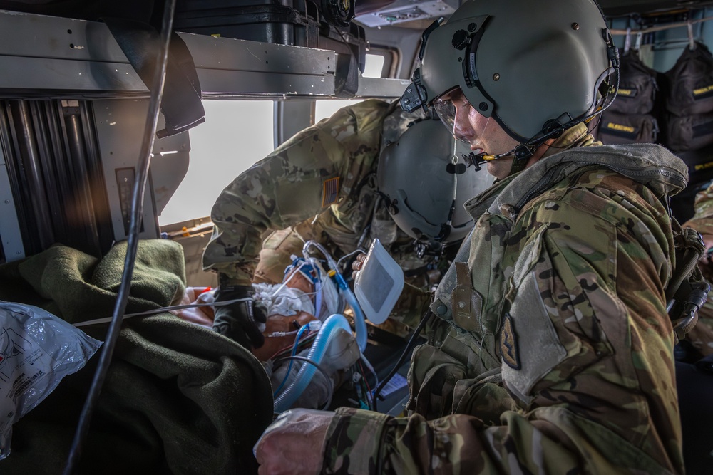 25th CAB Critical Care Flight Paramedic Conducts Medical Evaluation