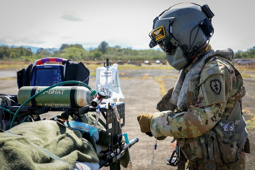 25th CAB Critical Care Flight Paramedic Conducts Medical Evaluation