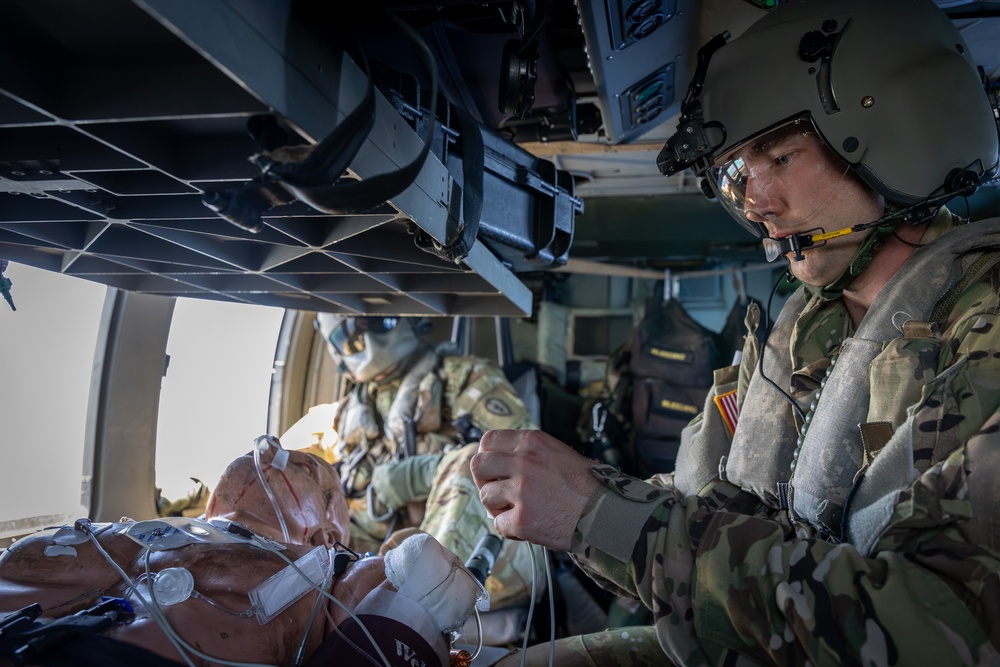 25th CAB Critical Care Flight Paramedic Conducts Medical Evaluation