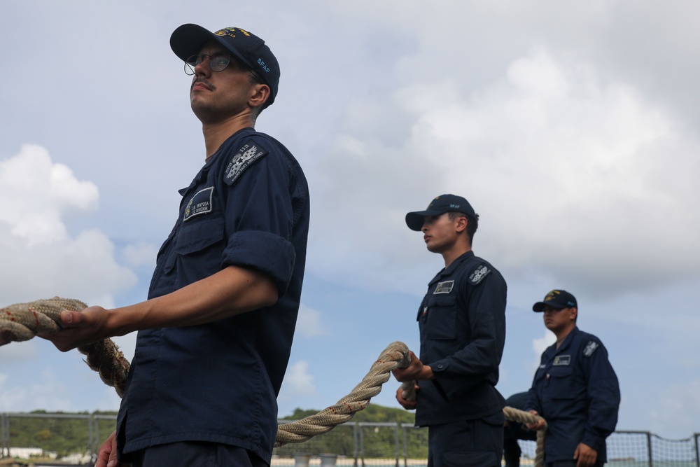 Sailors aboard the USS John Finn conduct a sea and anchor detail in Okinawa, Japan
