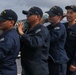 Sailors aboard the USS John Finn conduct a sea and anchor detail in Okinawa, Japan