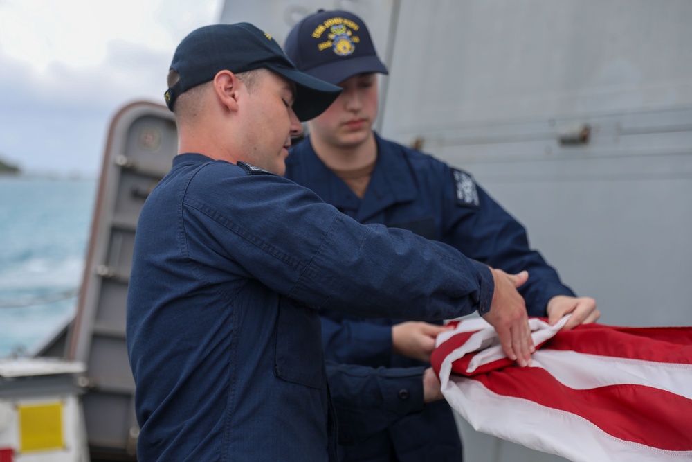 Sailors aboard the USS John Finn conduct a sea and anchor detail in Okinawa, Japan