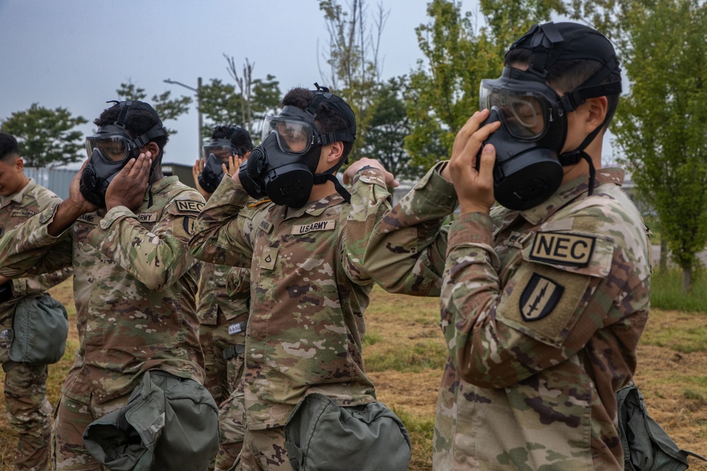 U.S. Army Soldiers, KATUSAs, and Civilians From USANEC-Humphreys 41st Signal Battalion Conduct CBRN Training