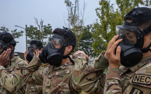 U.S. Army Soldiers, KATUSAs, and Civilians From USANEC-Humphreys 41st Signal Battalion Conduct CBRN Training