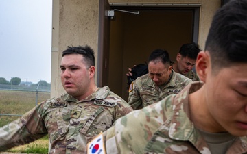 U.S. Army Soldiers, KATUSAs, and Civilians From USANEC-Humphreys 41st Signal Battalion Conduct CBRN Training