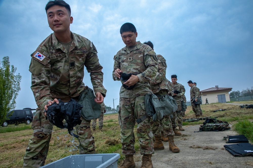 U.S. Army Soldiers, KATUSAs, and Civilians From USANEC-Humphreys 41st Signal Battalion Conduct CBRN Training