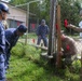 Multinational service members help make repairs at Aimeliik Elementary School