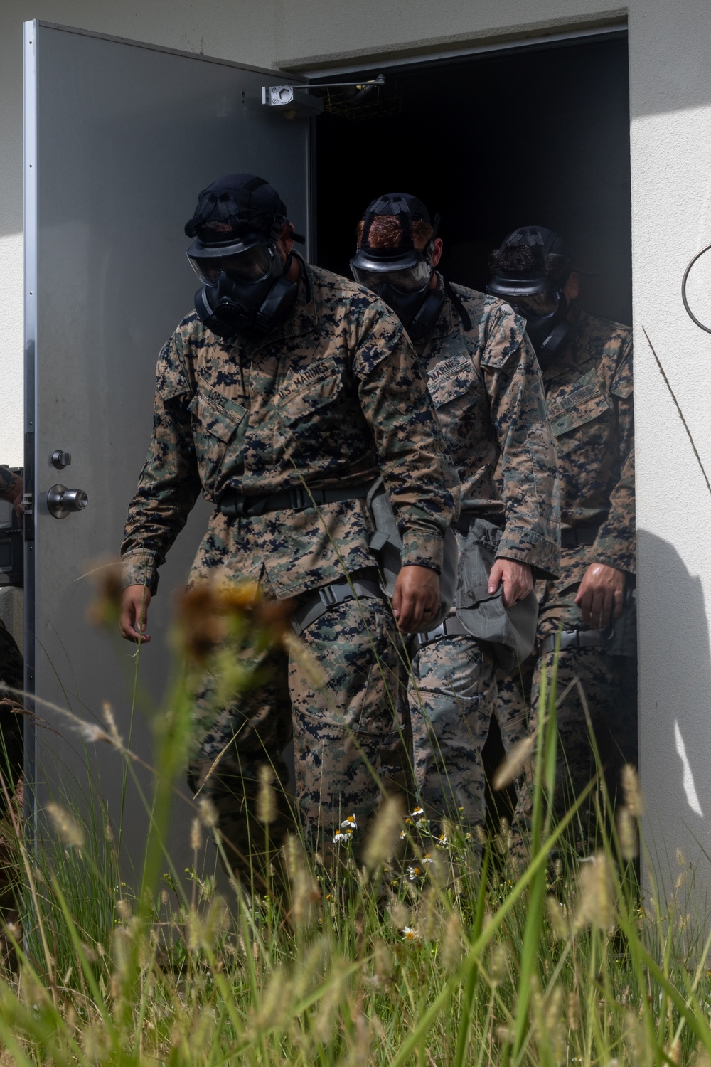 U.S. Marines conduct chemical, biological, radiological and nuclear defense training at Camp Hansen