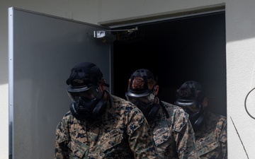 U.S. Marines conduct chemical, biological, radiological and nuclear defense training at Camp Hansen