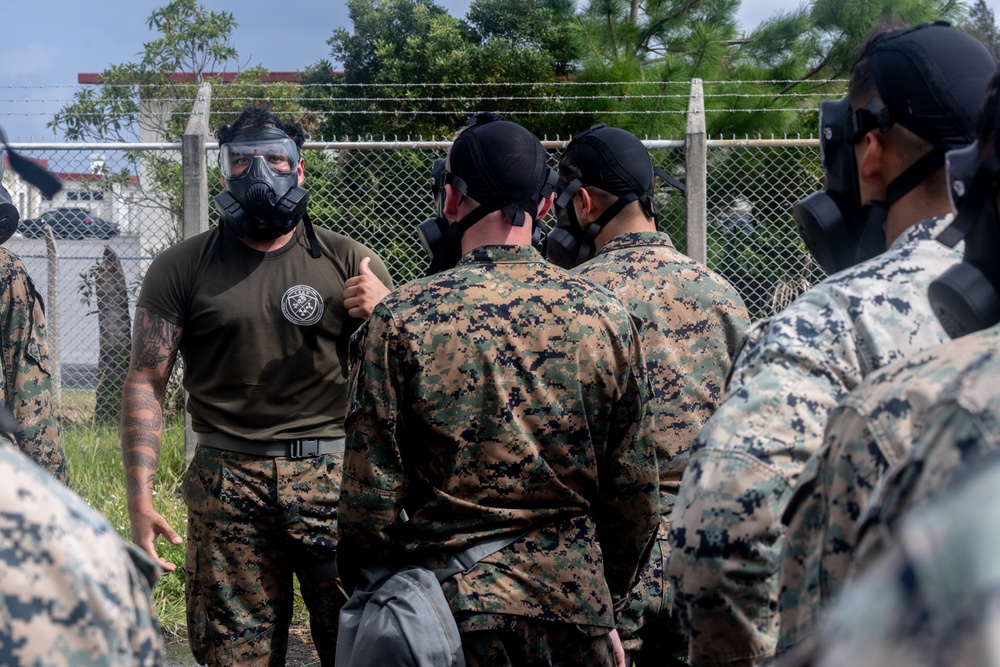 U.S. Marines conduct chemical, biological, radiological and nuclear defense training at Camp Hansen