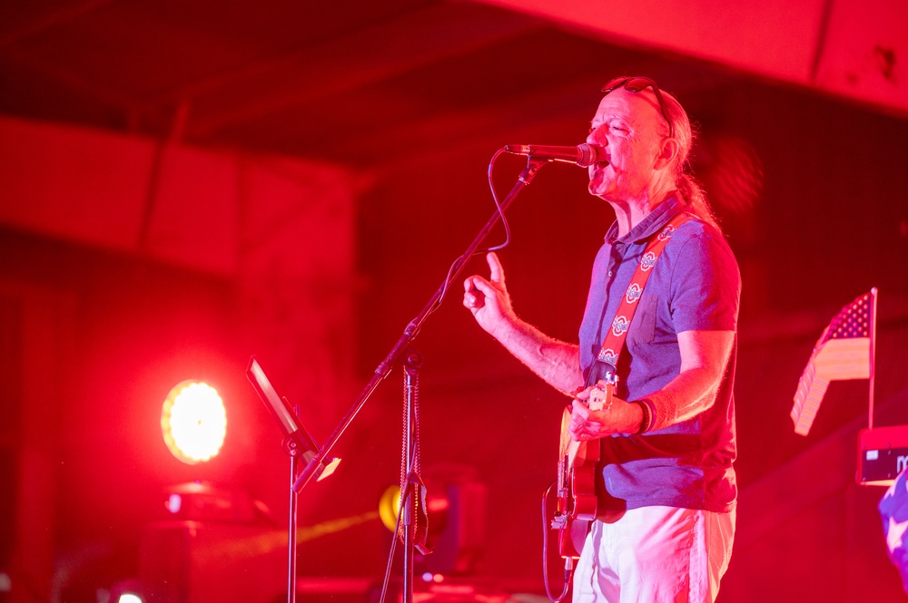 3 Car Garage Band visits the 386th AEW