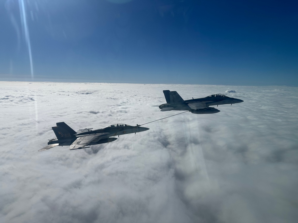 VFA-213 F/A-18F Super Hornets Fly Over the North Sea with U.K. Royal Navy 1st Sea Lord VFA-213 F/A-18F Super Hornets Fly Over the North Sea with U.K. Royal Navy 1st Sea Lord