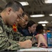 Sailors take the E-5 examination on board USS Iwo Jima (LHD 7)