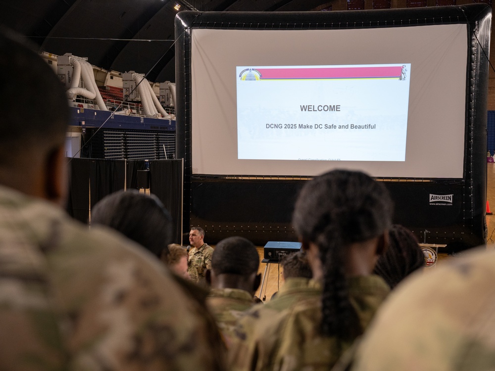 Soldiers with the 256th Infantry Brigade Combat Team receive an initial briefing and are sworn in for deputization