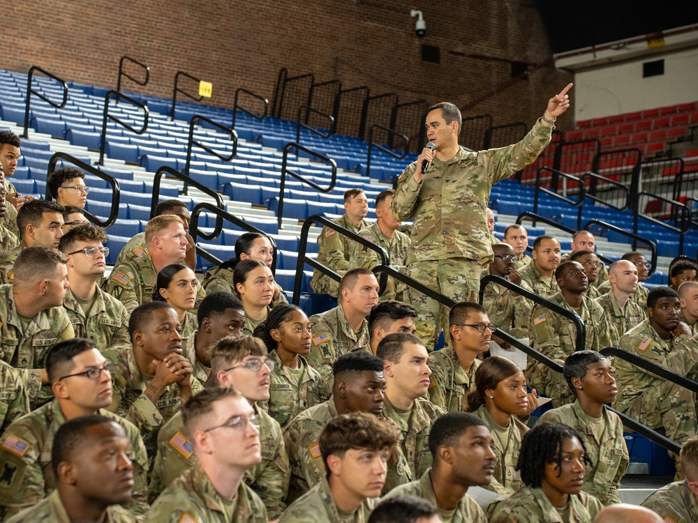Soldiers with the 256th Infantry Brigade Combat Team receive an initial briefing and are sworn in for deputization