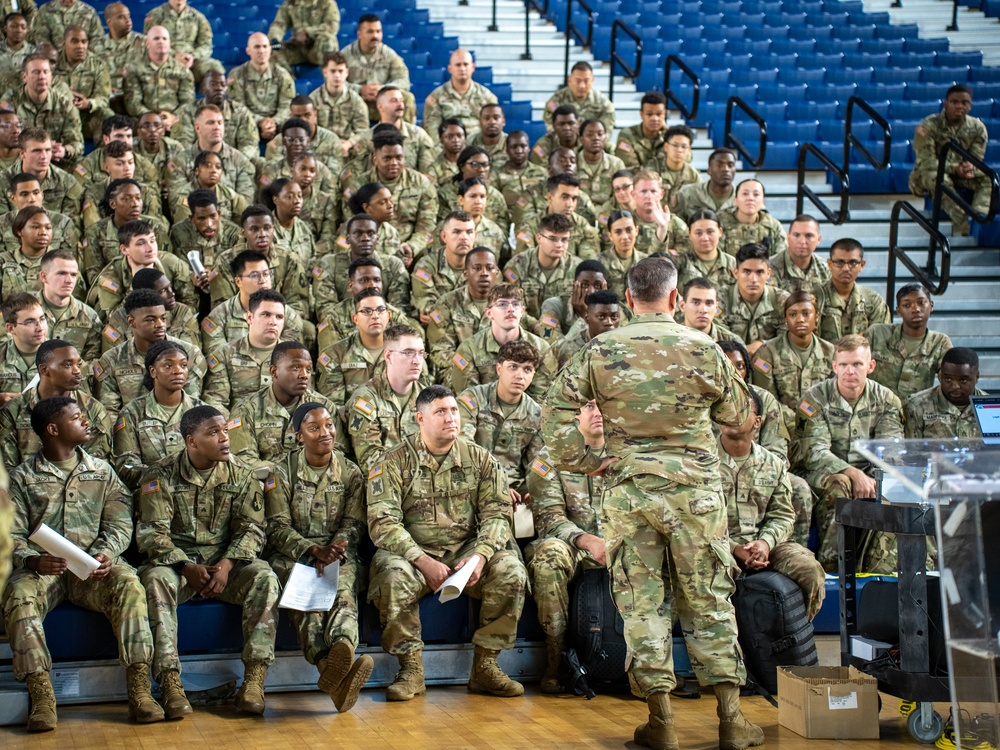 Soldiers with the 256th Infantry Brigade Combat Team receive an initial briefing and are sworn in for deputization