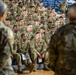 Soldiers with the 256th Infantry Brigade Combat Team receive an initial briefing and are sworn in for deputization