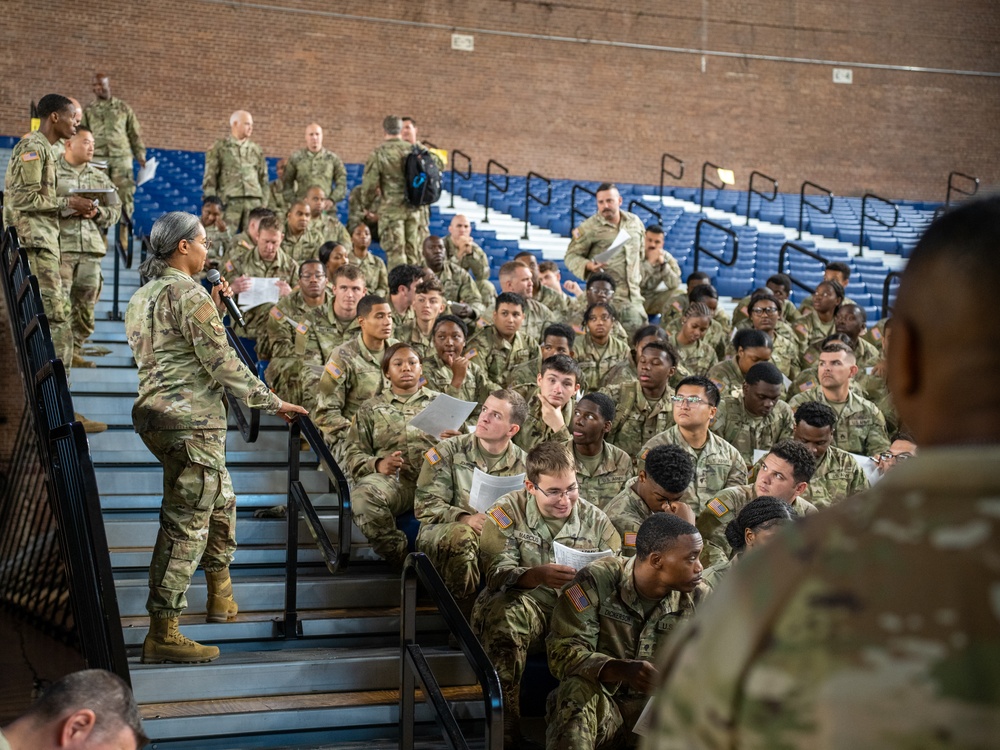 Soldiers with the 256th Infantry Brigade Combat Team receive an initial briefing and are sworn in for deputization