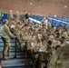 Soldiers with the 256th Infantry Brigade Combat Team receive an initial briefing and are sworn in for deputization
