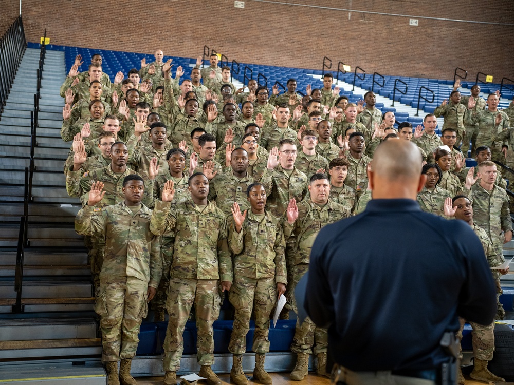 Soldiers with the 256th Infantry Brigade Combat Team receive an initial briefing and are sworn in for deputization