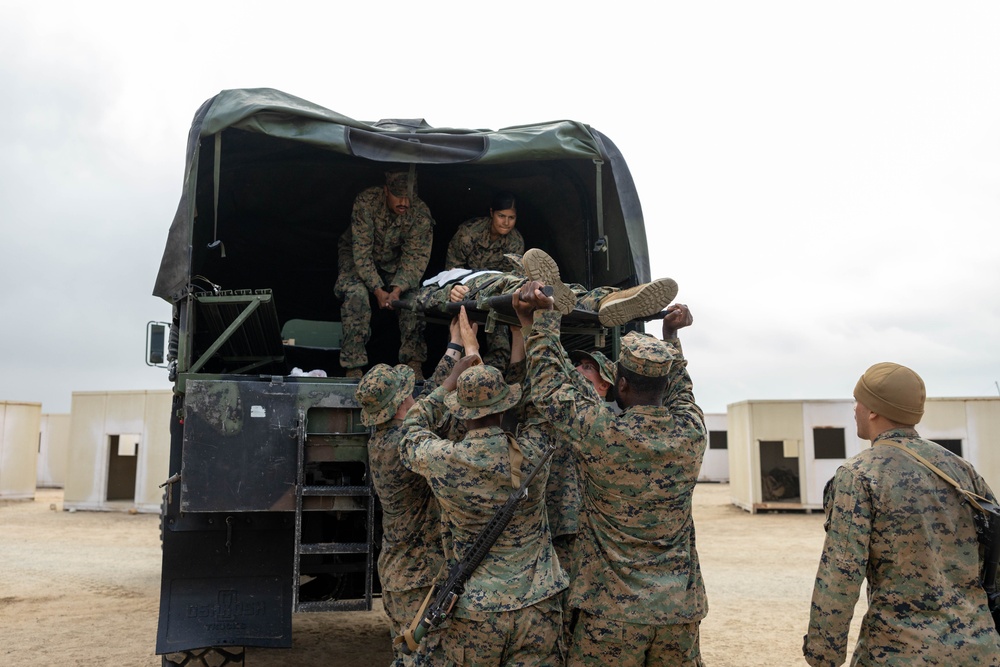 Marines and Sailors with CLB-7 and 1st Med Bn participate in a FEX