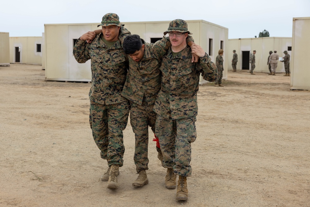 Marines and Sailors with CLB-7 and 1st Med Bn participate in a FEX