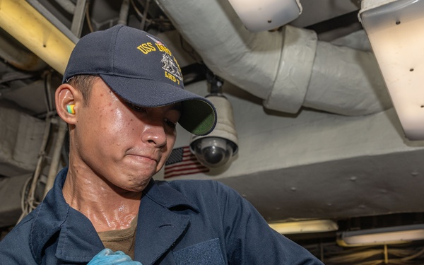 USS Iwo Jima (LHD 7) Sailor Assembles a Burner Barrel
