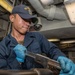 USS Iwo Jima (LHD 7) Sailor Assembles a Burner Barrel
