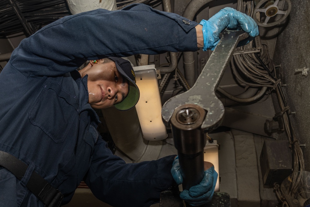 USS Iwo Jima (LHD 7) Sailor Assembles a Burner Barrel