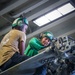 USS Iwo Jima Sailors Conduct Maintenance on a MH-60S