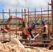 Construction Crews Measure for Rebar on the site of a New Project on Camp Blaz