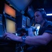 USS WAYNE E. MEYER SAILORS STAND WATCH IN THE COMBAT INFORMATION CENTER