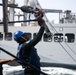 USS WAYNE E. MEYER SAILORS CONDUCT RAS WITH USNS JOHN LEWIS