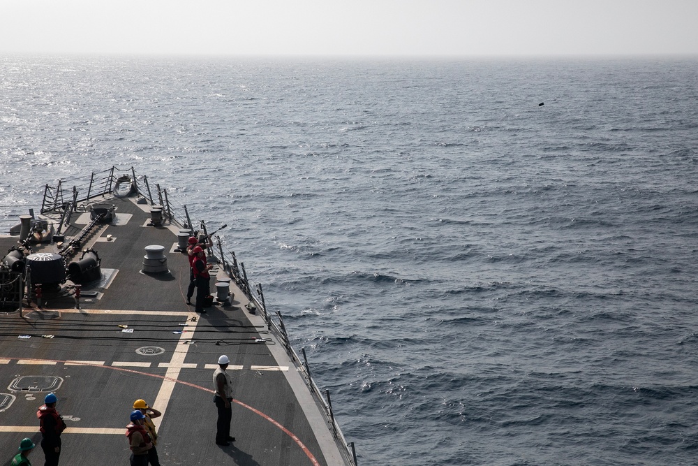 USS WAYNE E. MEYER SAILORS CONDUCT RAS WITH USNS JOHN LEWIS