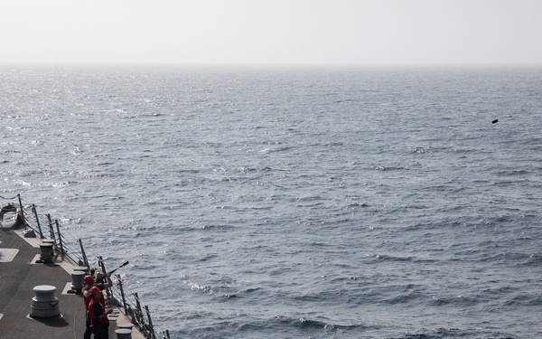 USS WAYNE E. MEYER SAILORS CONDUCT RAS WITH USNS JOHN LEWIS