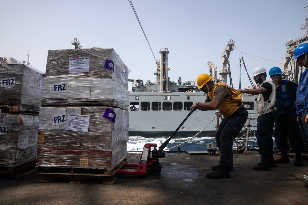 USS WAYNE E. MEYER SAILORS CONDUCT RAS WITH USNS JOHN LEWIS