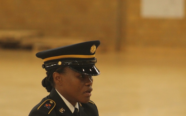 Handing Off a Folded American Flag