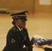 Handing Off a Folded American Flag