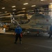 USS Iwo Jima Sailors Move A MH-60S Seahawk